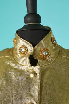 Gold leather jacket with glass cabochons and metal Circa 1980's