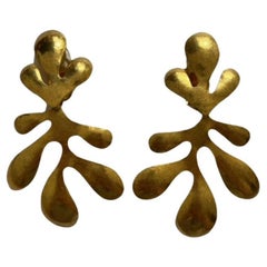 Gold Leave Dangeling Clip-on Earrings by Herve Van Der Straeten