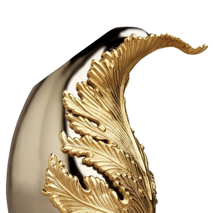 Vase gold leave in polished stainless
steel with 24-karat gold-plated leave.