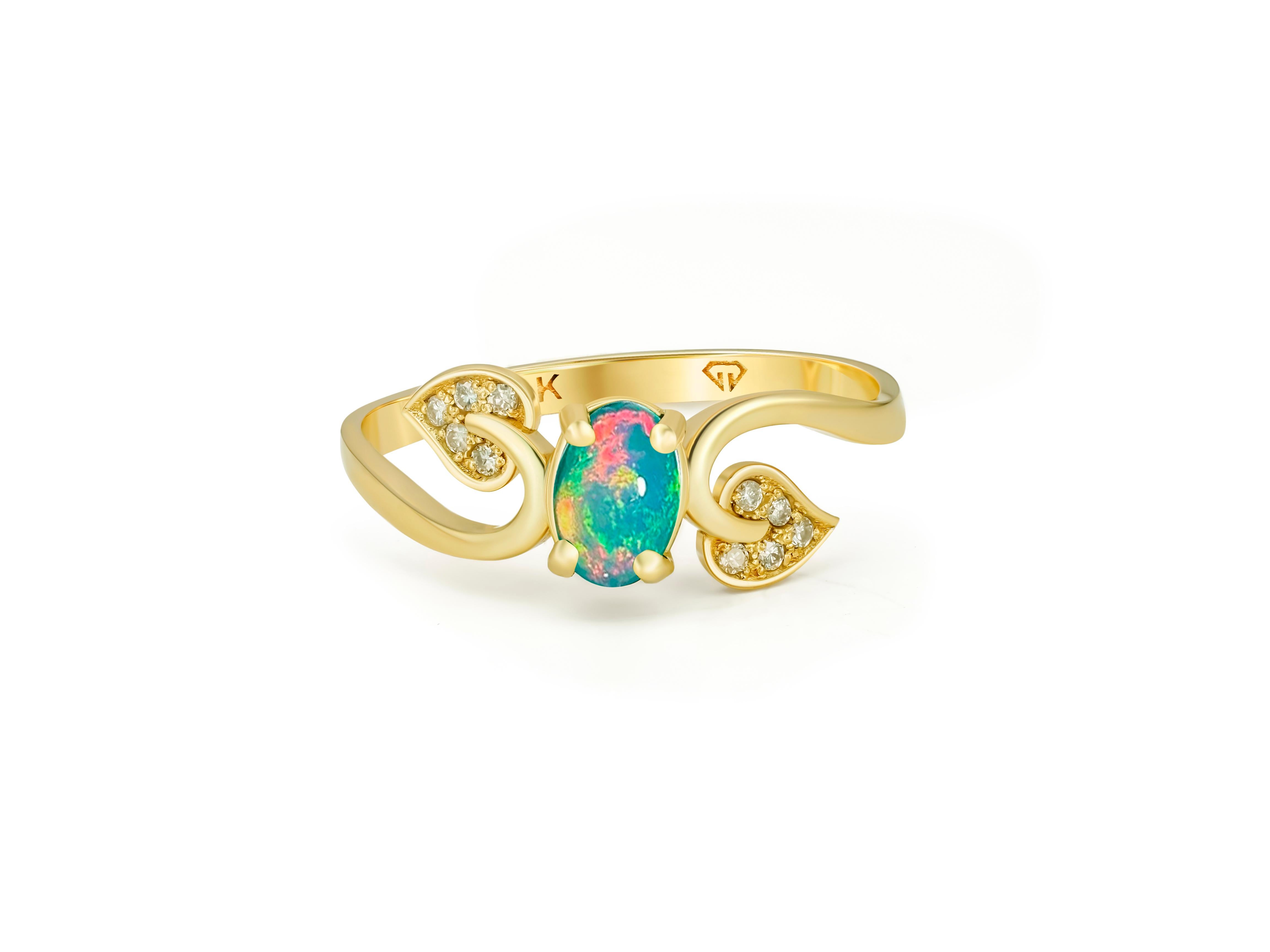 Gold leaves ring with opal. 
Opal engagement ring. Opal 14k gold ring. Opal vintage ring. October birthstone ring. Oval Opal ring.

Metal: 14kt solid gold
Total weight: 1.8 gr (depends from size).

Central gemstone: Natural Opal
Color: multicolor.