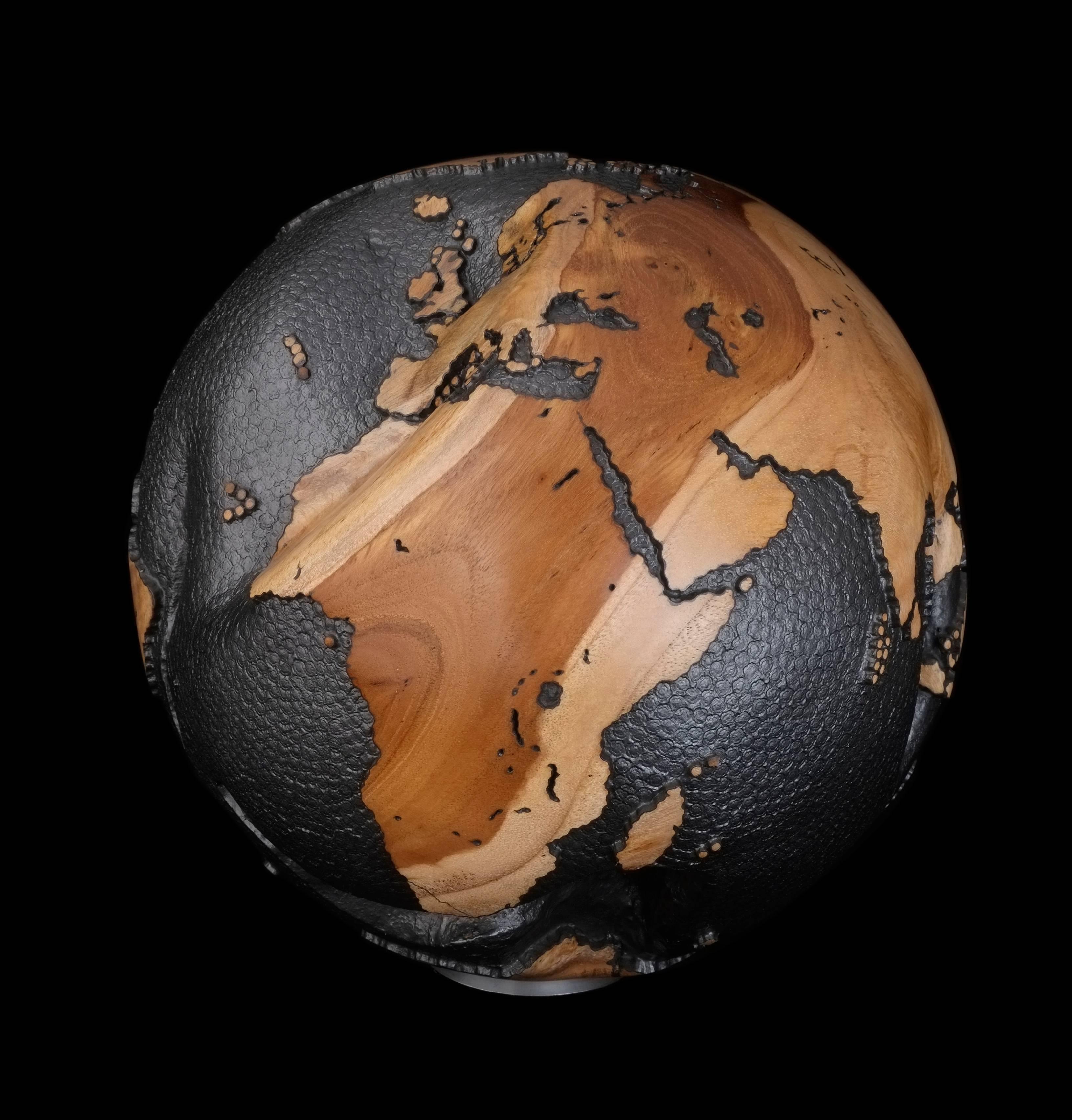 Gold Line accents wooden globe is made from reclaimed teak root, thin gold line accents on some crevices of the wood create astonishing harmony to the natural stripes of the continents with steel hammered round and graphite finishing on the ocean