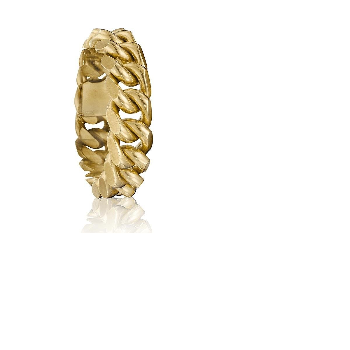 A French Mid-20th Century 18 karat gold bracelet by Cartier. .  Circa 1960's.
Signed, 