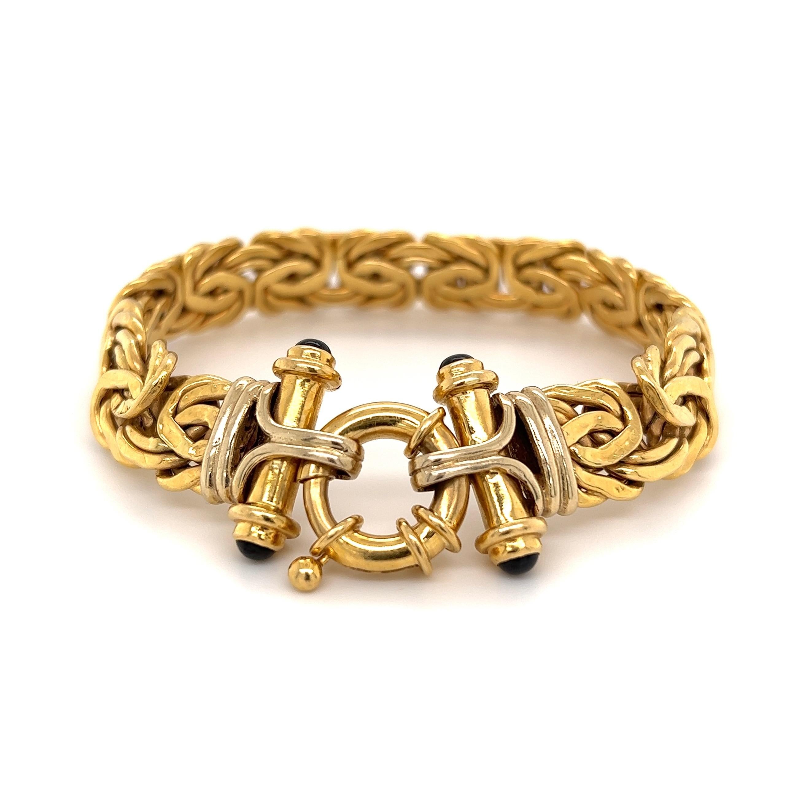 Simply Beautiful! High Quality Deluxe Weave Link Gold Bracelet with Onyx set Toggle Clasp. Approx. 7.25