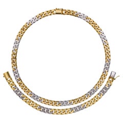 Collier et bracelet à maillons en or sertis de diamants ronds