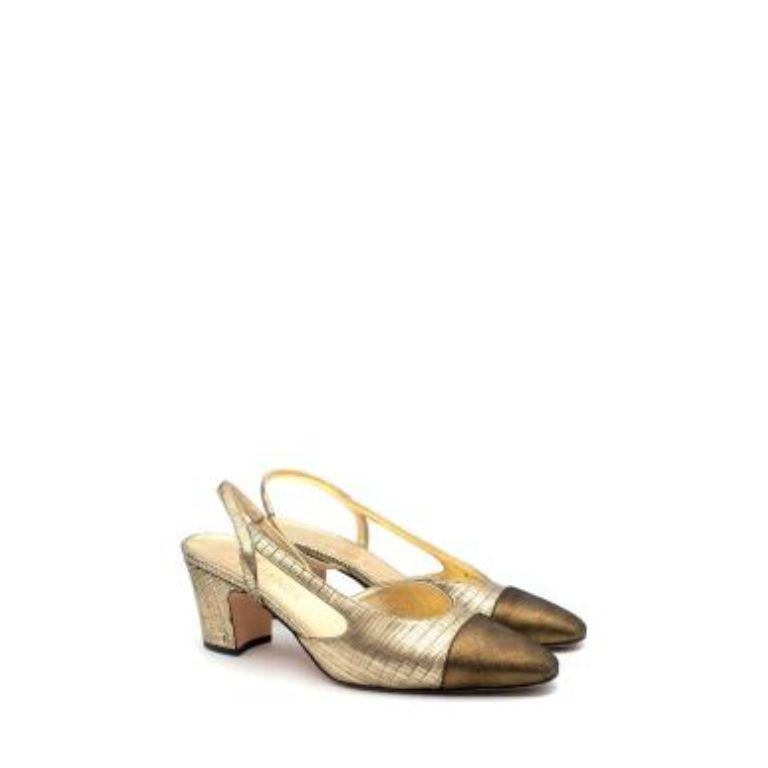 Chanel Gold Lizard Embossed Leather Slingback Heeled Pumps
 

 - Lizard embossed leather with a metallic gold-tone finish
 - Classic slingback shape with a contrast toe cap and midheight block heel
 

 Materials: 
 Leather 
 

 Made in Italy 
 

