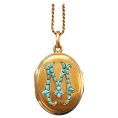Gold Locket with the Initial M Set with Turquoises