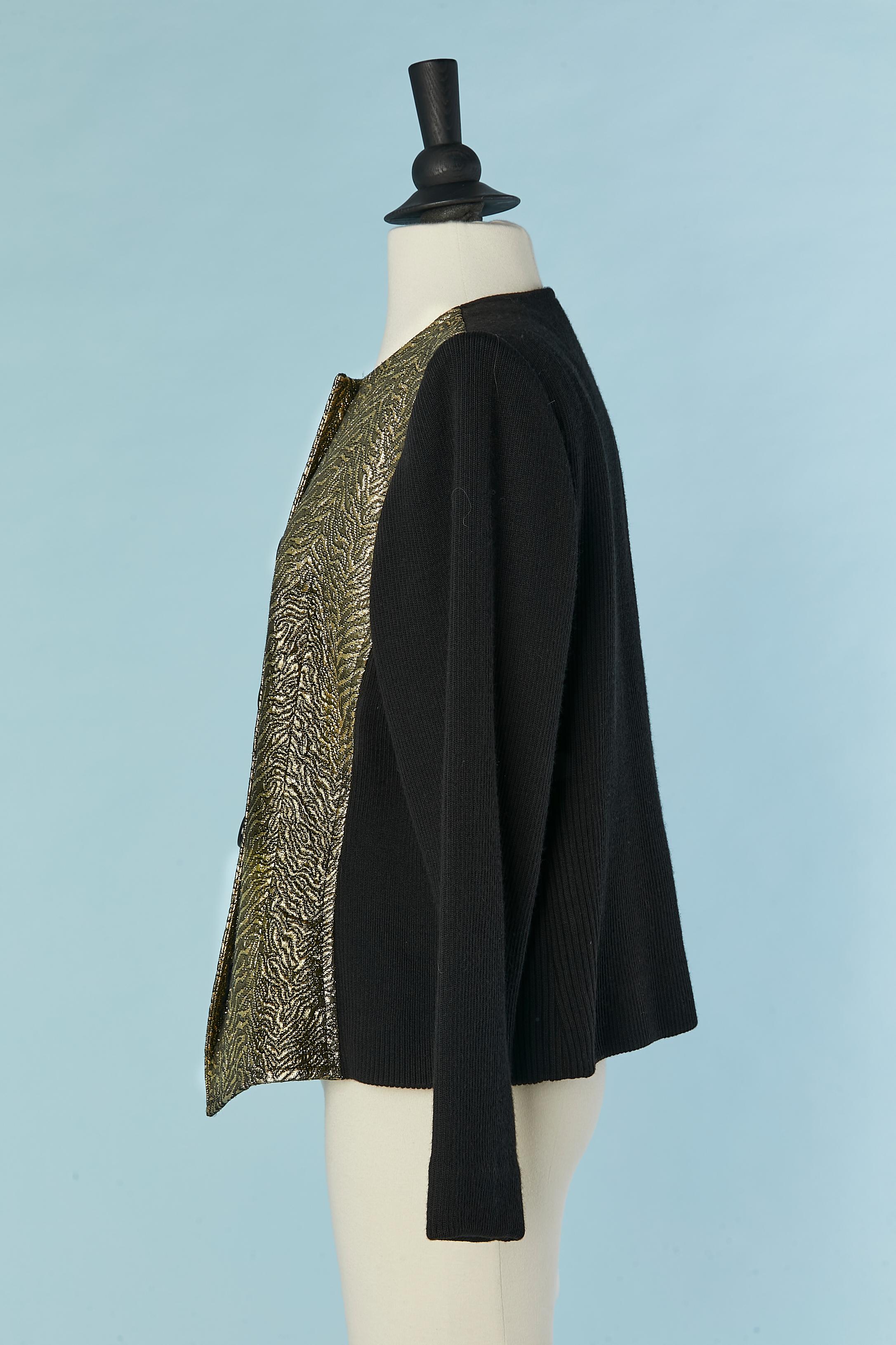 Gold lurex brocade single breasted jacket with sleeve and back in black knit. Rayon lining. Buttons and buttonholes closure in the middle front. Shoulder-pad. 
SIZE 42 (Fr) L 