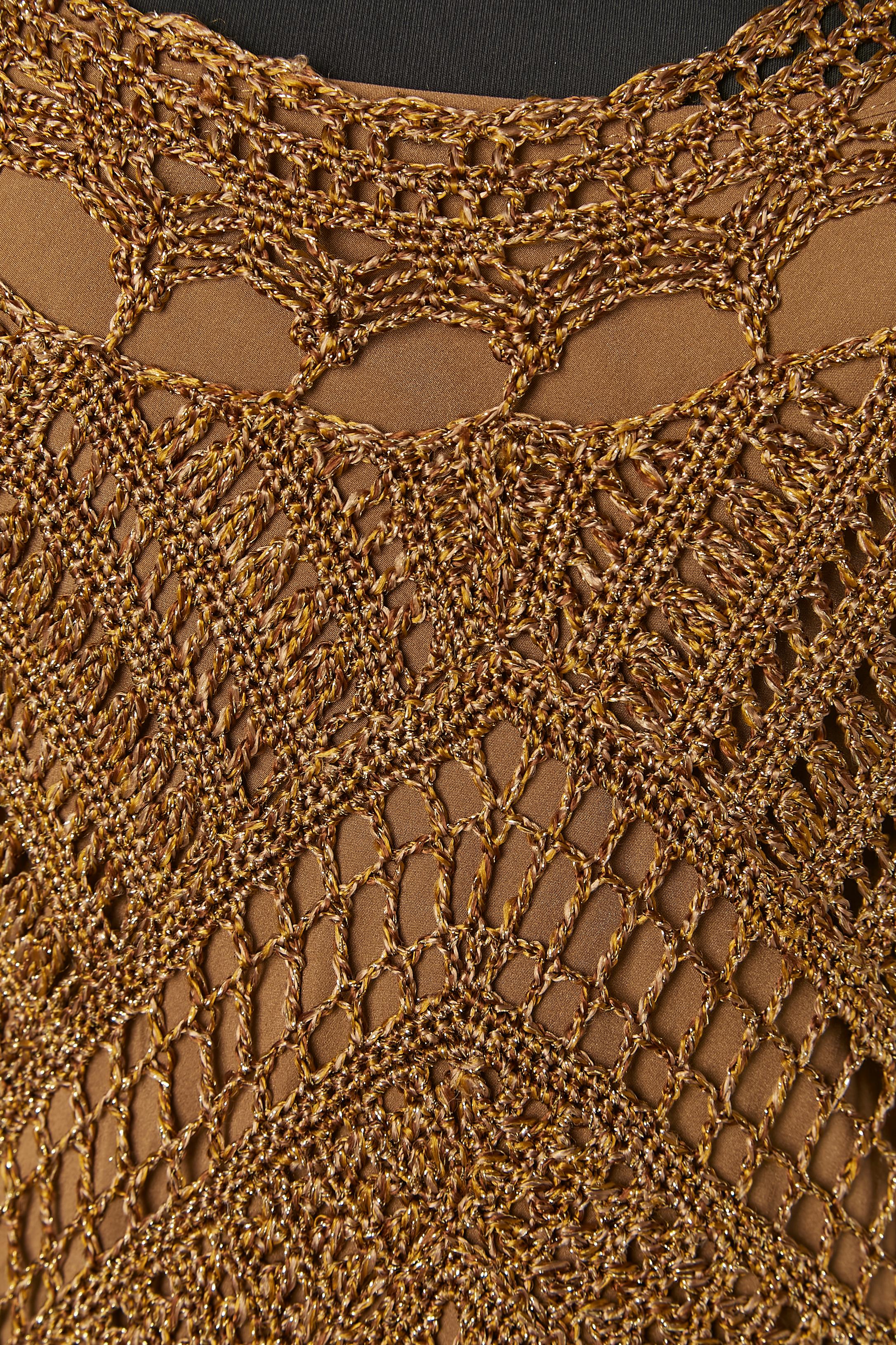 Abito all'uncinetto in lurex oro con fodera. 
TAGLIA S 