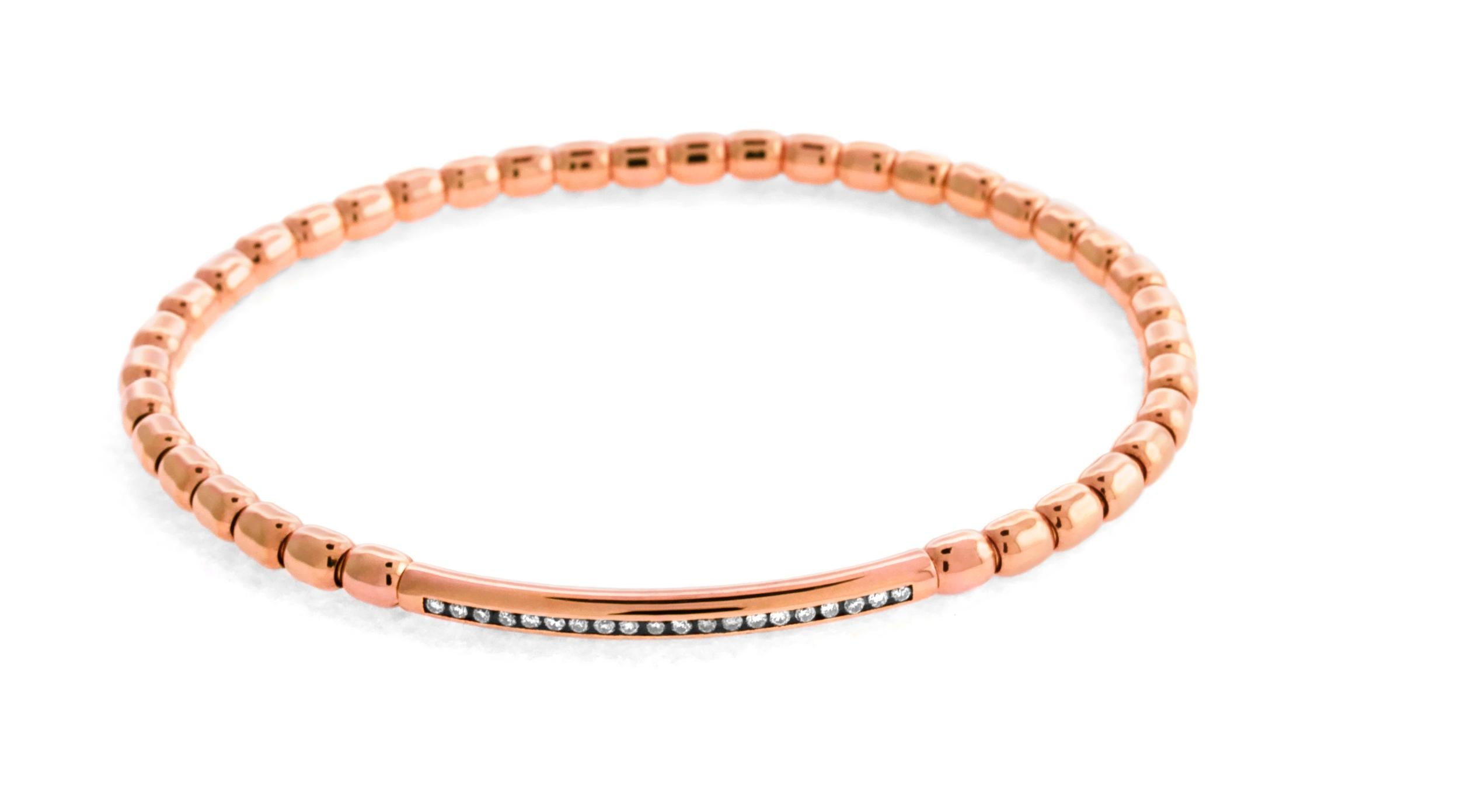 A delicate collection exploring innovative design and fine beauty. ThIs 18 karat beaded bracelet is specially designed using an elastic which is concealed with a fine inner tube fitting of 18K gold. Fitted with 20 brilliant cut 0.19carat diamonds