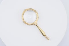 Gold Magnifying Glass Pendant with Diamonds