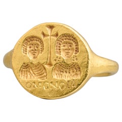 Gold Marriage Ring with Busts and Cross. Byzantine, 6th–7th century AD.