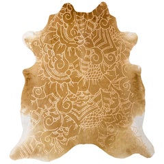 Tapis en cuir de vache caramel à motif Boho Batik doré et métallique:: moyen