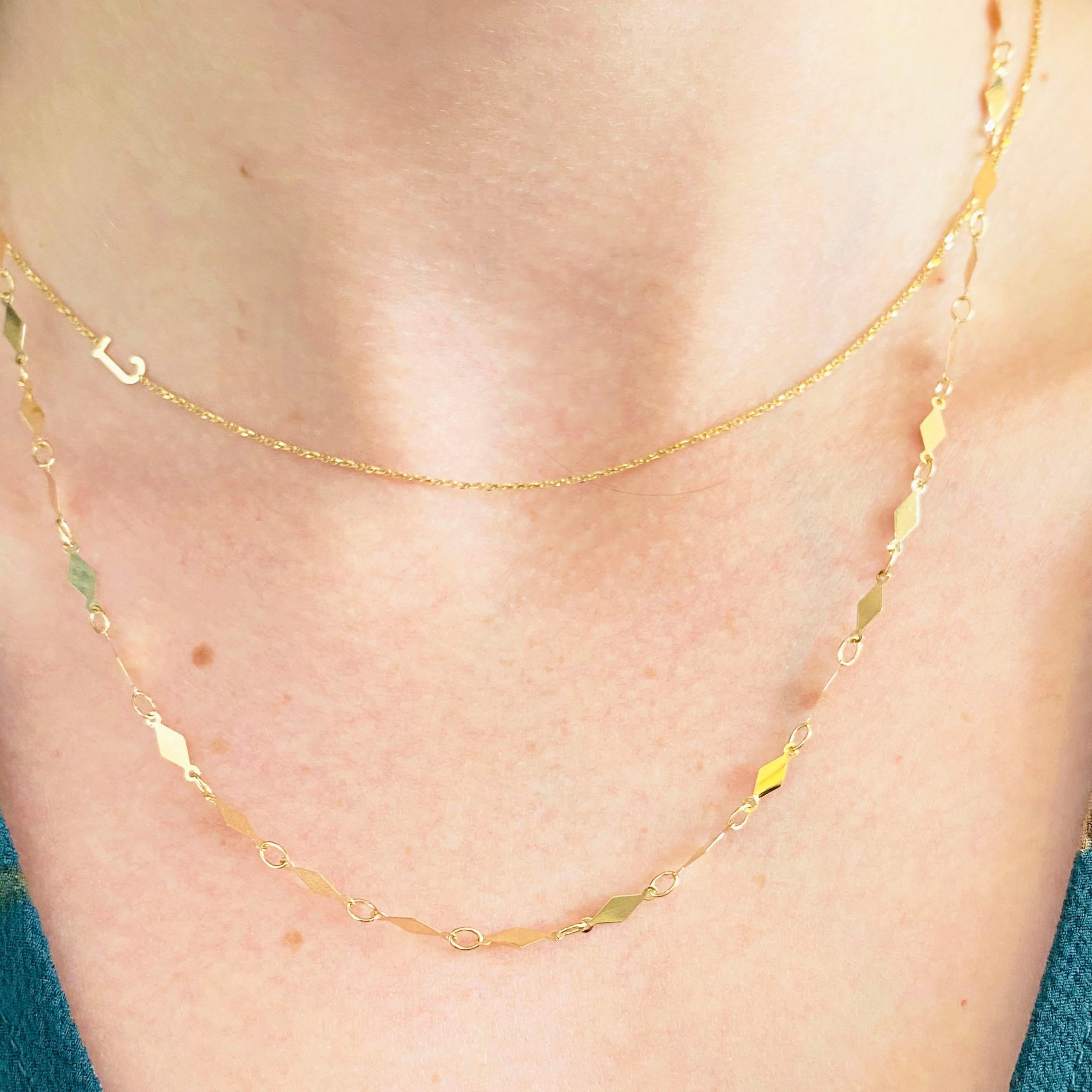 This 14k yellow gold sparkly, chain necklace matches everything and is the perfect addition to any outfit, casual or formal. Paired it with other necklaces, this necklace will make everything more shimmery! This necklace would make the perfect gift