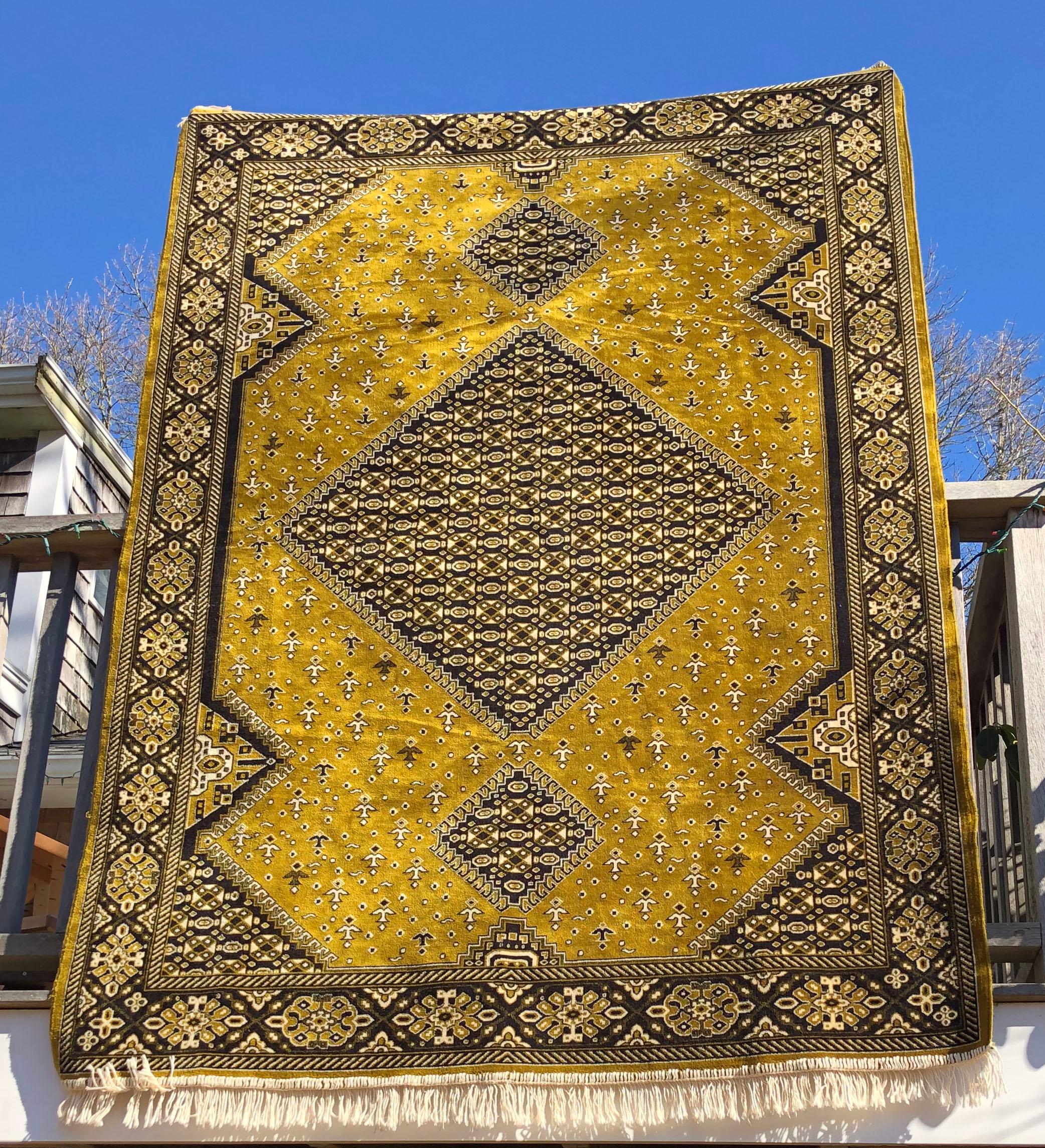 This gorgeous rug was acquired in the early 2000s at a women's co-operative in Ouarzazate, Morocco. It has exquisite construction and is very soft to the touch, silken velvet. It has a subtle sheen that changes in the light from gold to