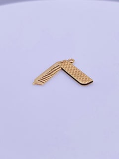 Gold Movable Comb Charm