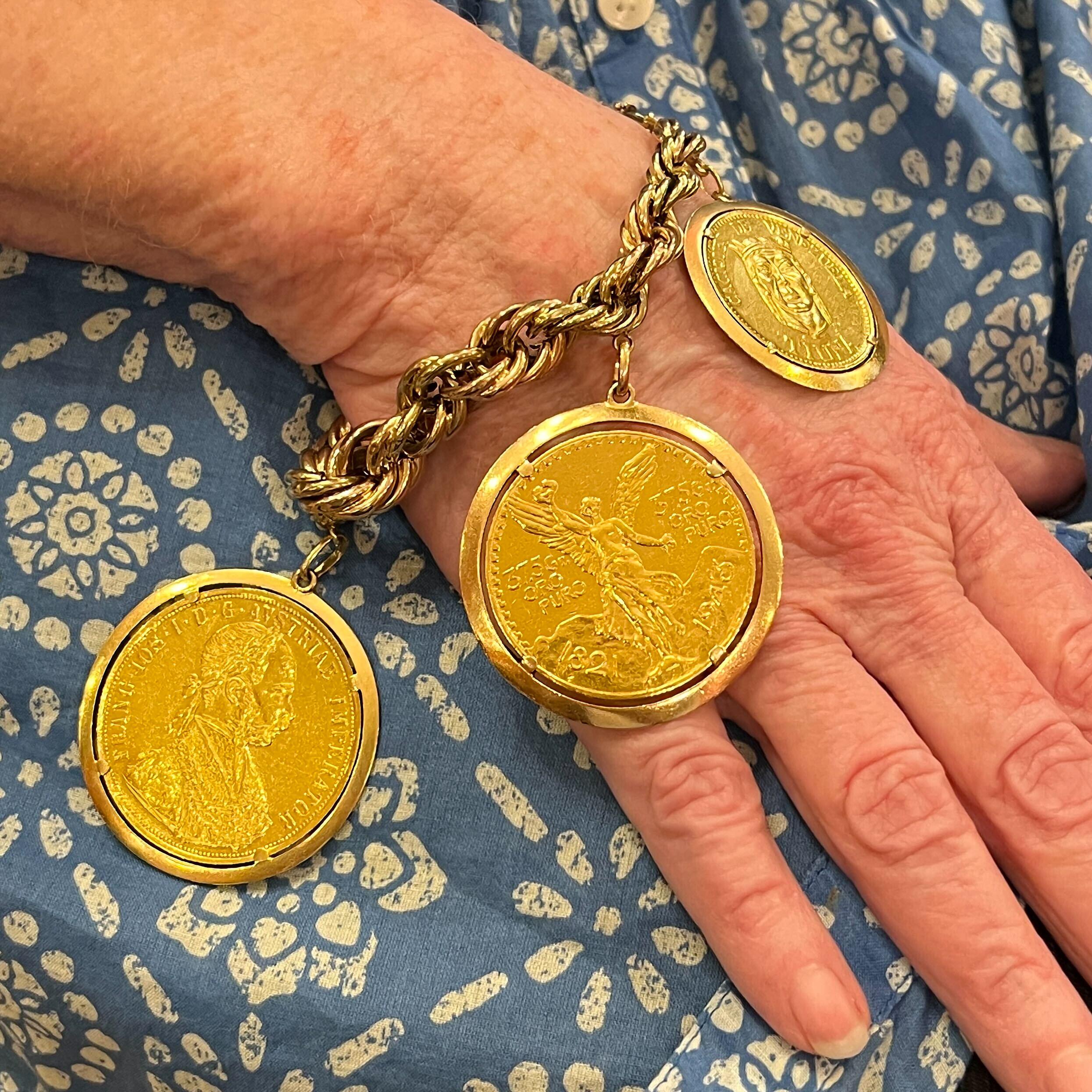 Gold Multi National Coin Charm Bracelet In Good Condition In New York, NY