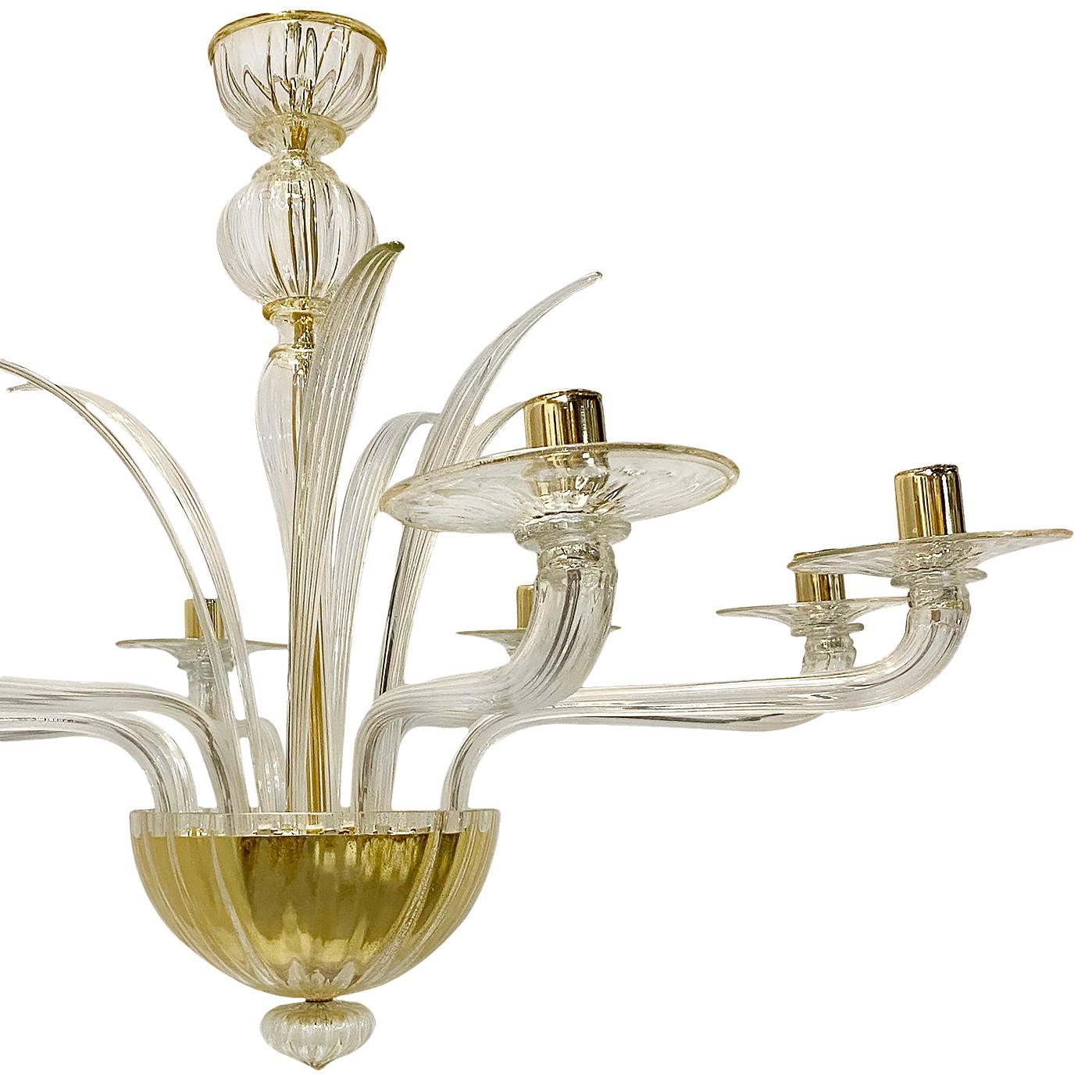 A circa 1960's Italian six-arm glass chandelier with gold insets in glass.

Measurements:
Diameter: 38