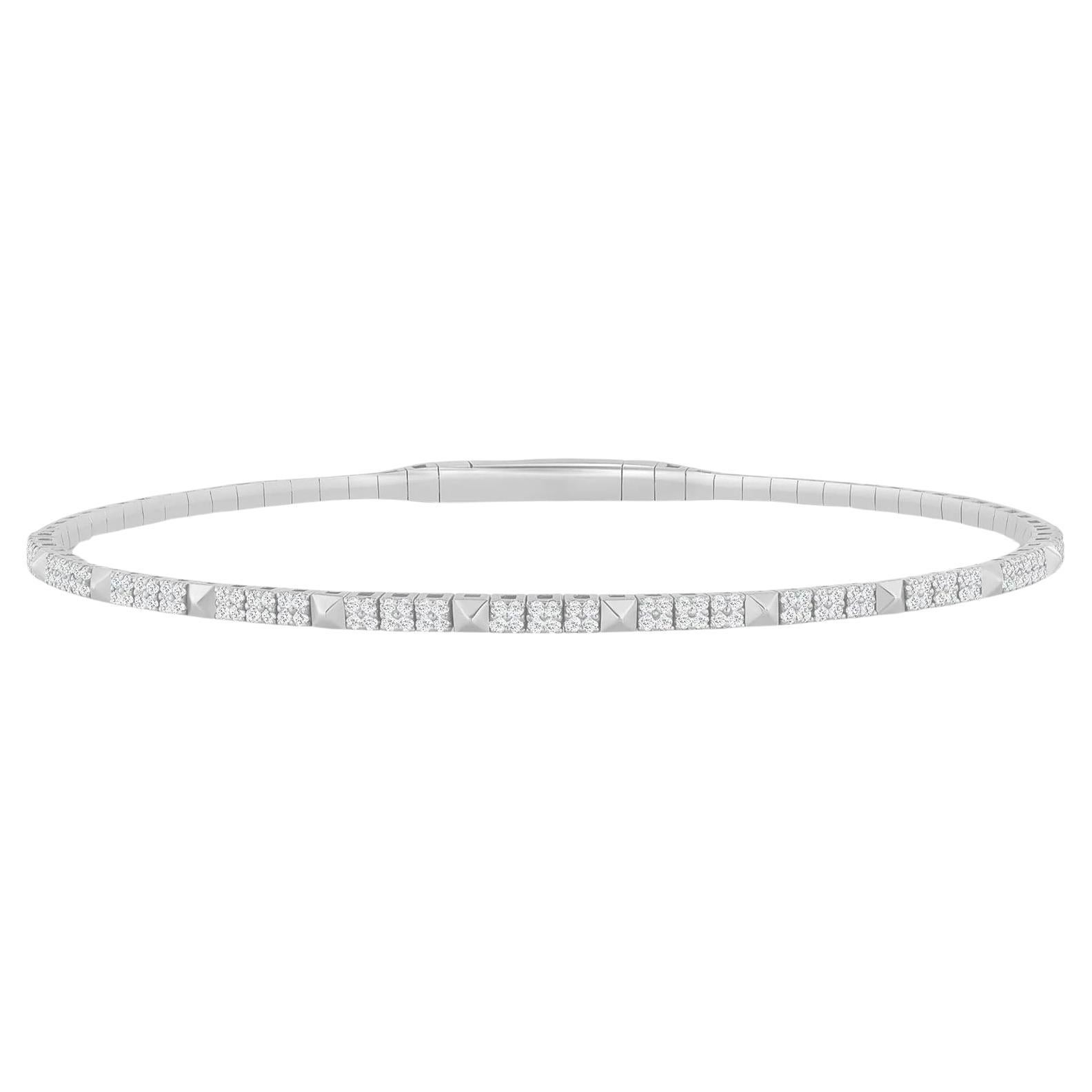 This diamond tennis bangle features beautifully cut round diamonds set gorgeously in 14k gold

Bracelet Information
Metal : 14k Gold
Diamond Cut : Round Natural Diamond
Total Diamond Carats : 0.80ct
Diamond Clarity : VS -SI
Diamond Color : F-G
Color