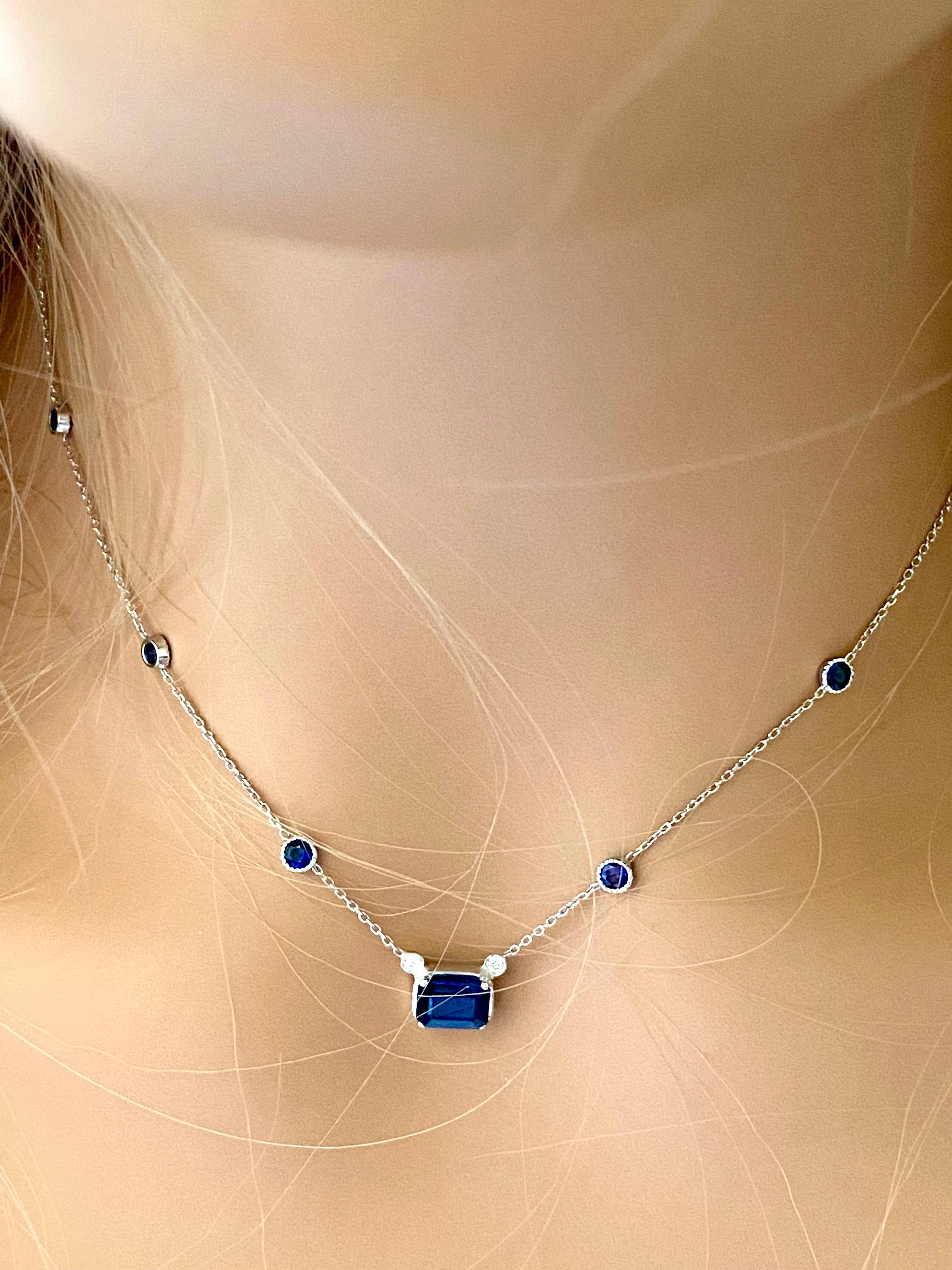 Contemporary White Gold Necklace Pendant Emerald Shaped Sapphire Diamonds Six Bezel Sapphire