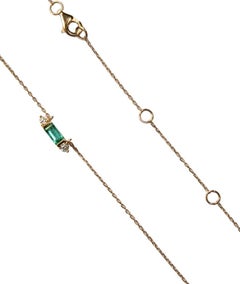 Gold Necklace with Baugette emerald and 2 Round Diamonds