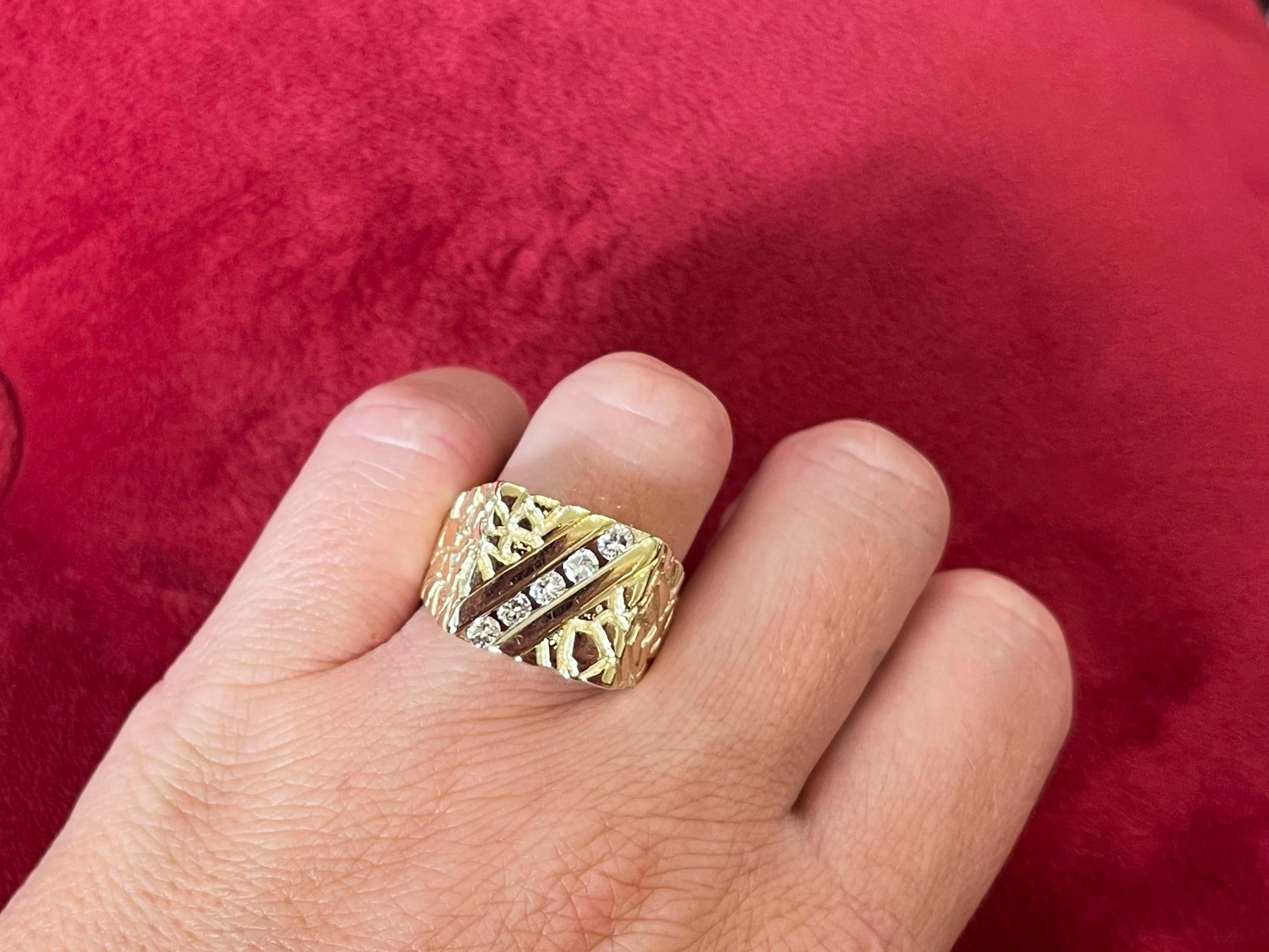 Item Specifications:

Metal: 14K Yellow Gold

Total Weight: 14.2 Grams

Ring Size: 10

Diamond Count: 5 Brilliant cut diamonds

Diamond Carat Weight: ~0.30 Carat

Diamond Color: G-H

Diamond Clarity: SI1-I1

Condition: Preowned, excellent

Stamped: