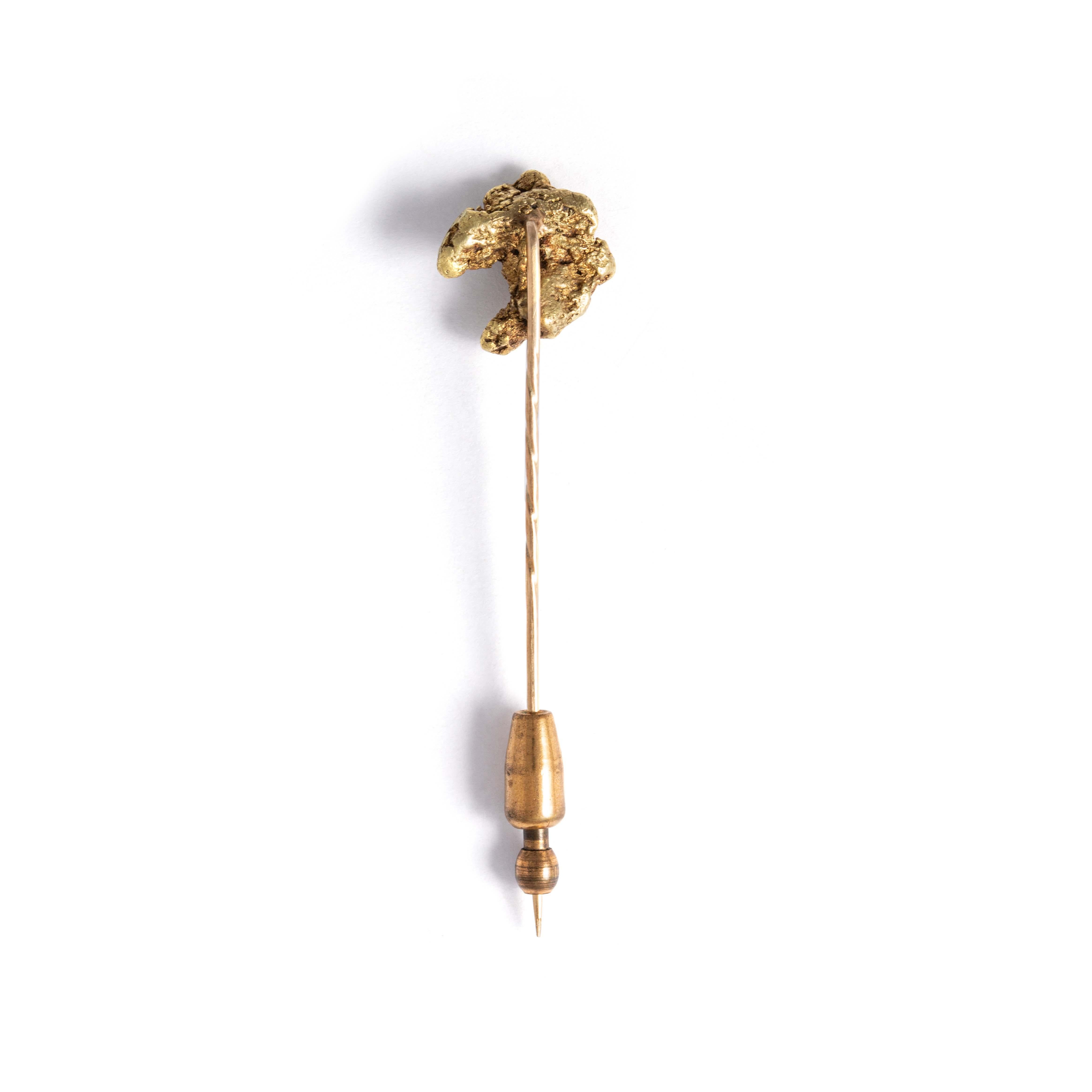 Gold Nugget mounted on a Vintage Pin 14K gold.
Height (including pin): 7.00 centimeters. 
Weight: 7.98 grams.