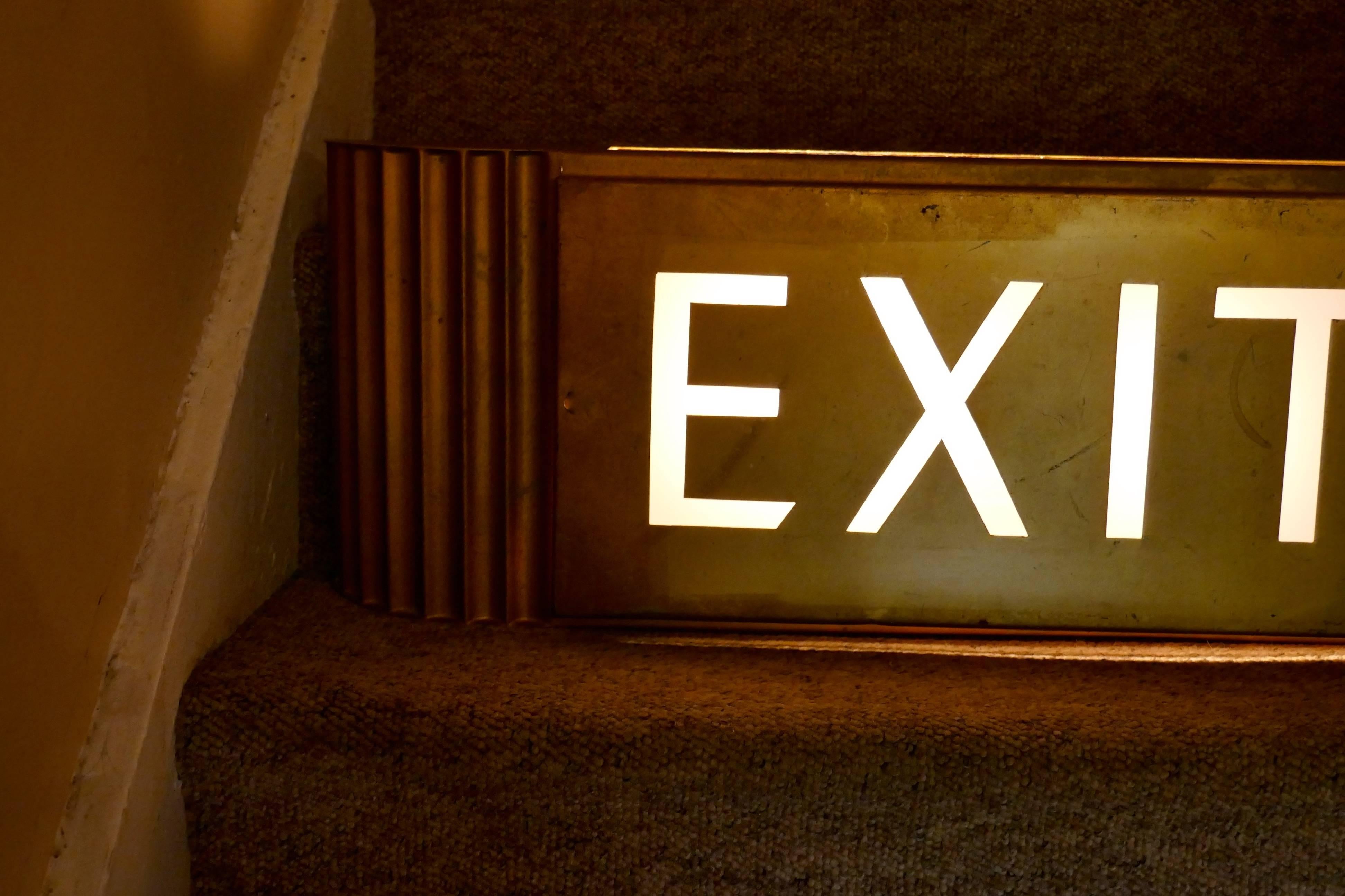 brass exit sign