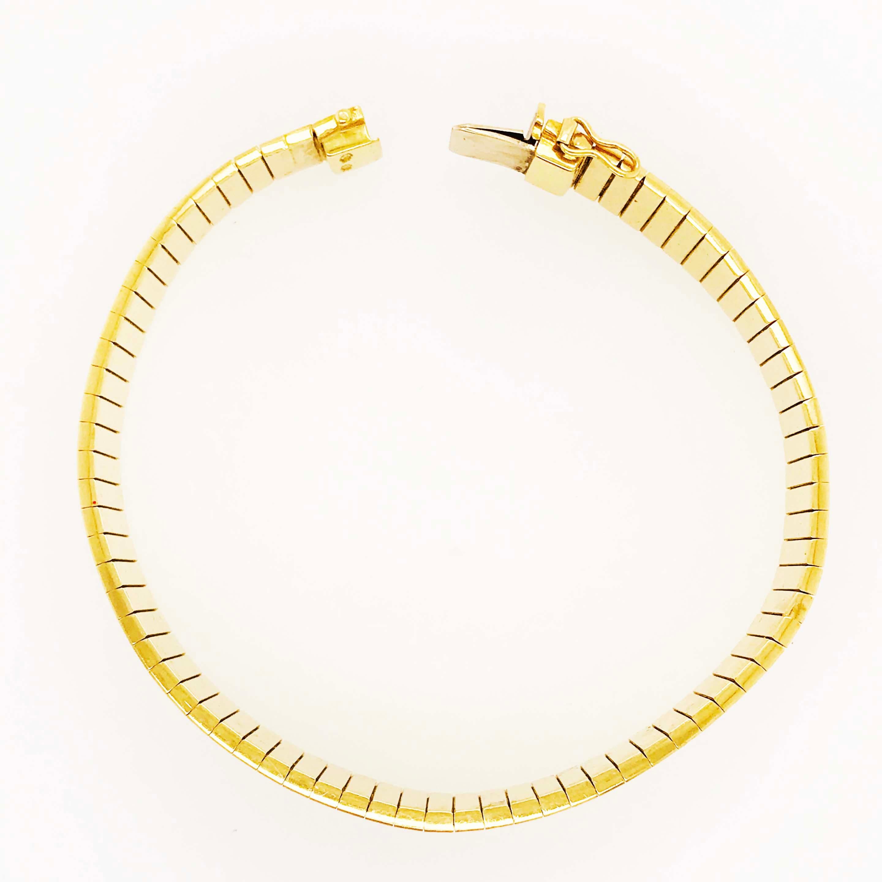 Le bracelet Omega en or jaune 18 carats est royal et ressemble à un bracelet jonc 6