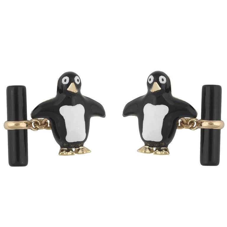 Gemelli da polso con pinguino smaltato in oro e onice