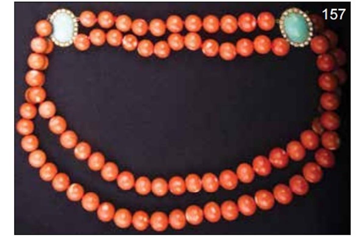 Oriental Red Coral Necklace with 12 mm diameter spheres.

Gold clasp with decorative element in cabouchon natural turquoise and diamonds.

DIA cutting 8/8 0.80 / 0.90 ct (presumed), 4 color, US1 cabouchon natural turquoise.

Declaration of