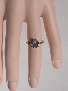 Gold Oval Aquamarine and Diamond Solitaire Ring