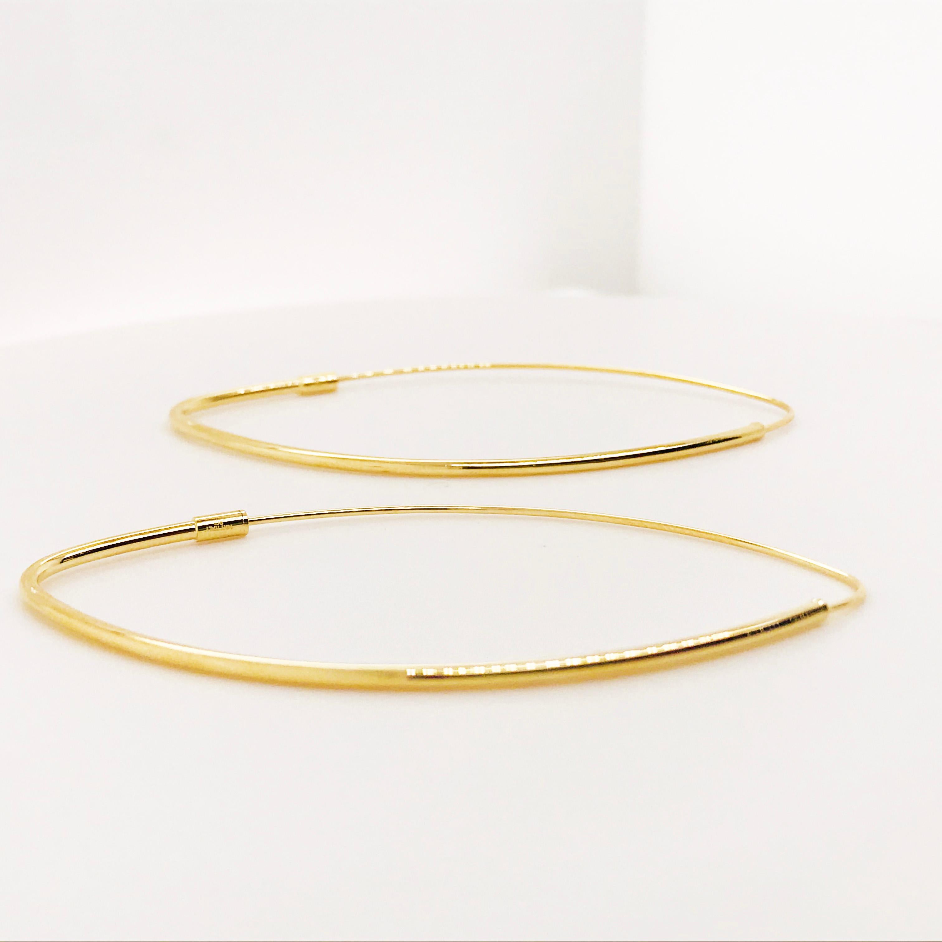 thin gold oval hoop earrings