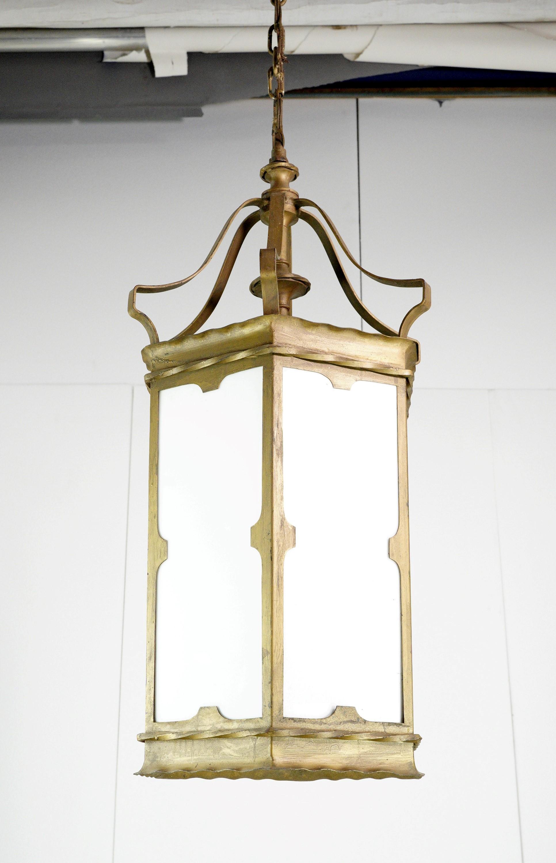 Early 20th Century pendant lantern with white glass panels and a gold painted steel frame. This lantern has four standard bulbs. Cleaned and restored. This will be cleaned and rewired before shipping. Please note, this item is located in our