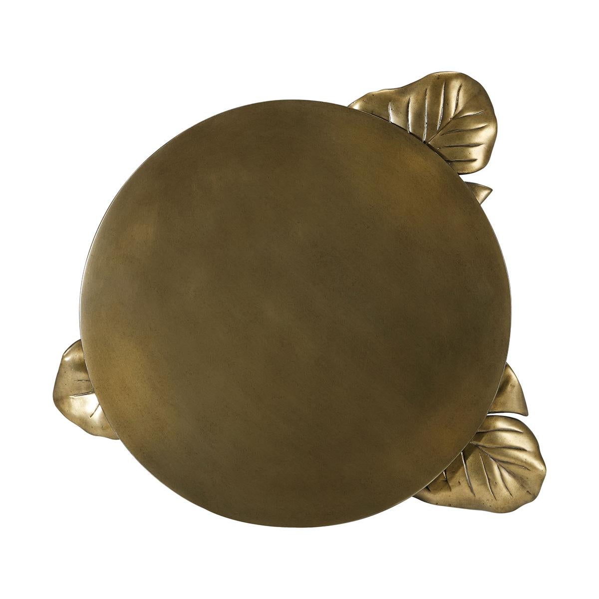 An artful blend of form and function, is a stunning sculptural statement piece. Depicting the natural elegance of banana leaves, this piece is hand cast and finished in the Venetian gold finish.

Dimensions: 17