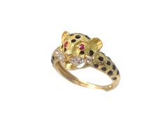 Gold Panther Ring after Cartier Maison , diamands, ruby
