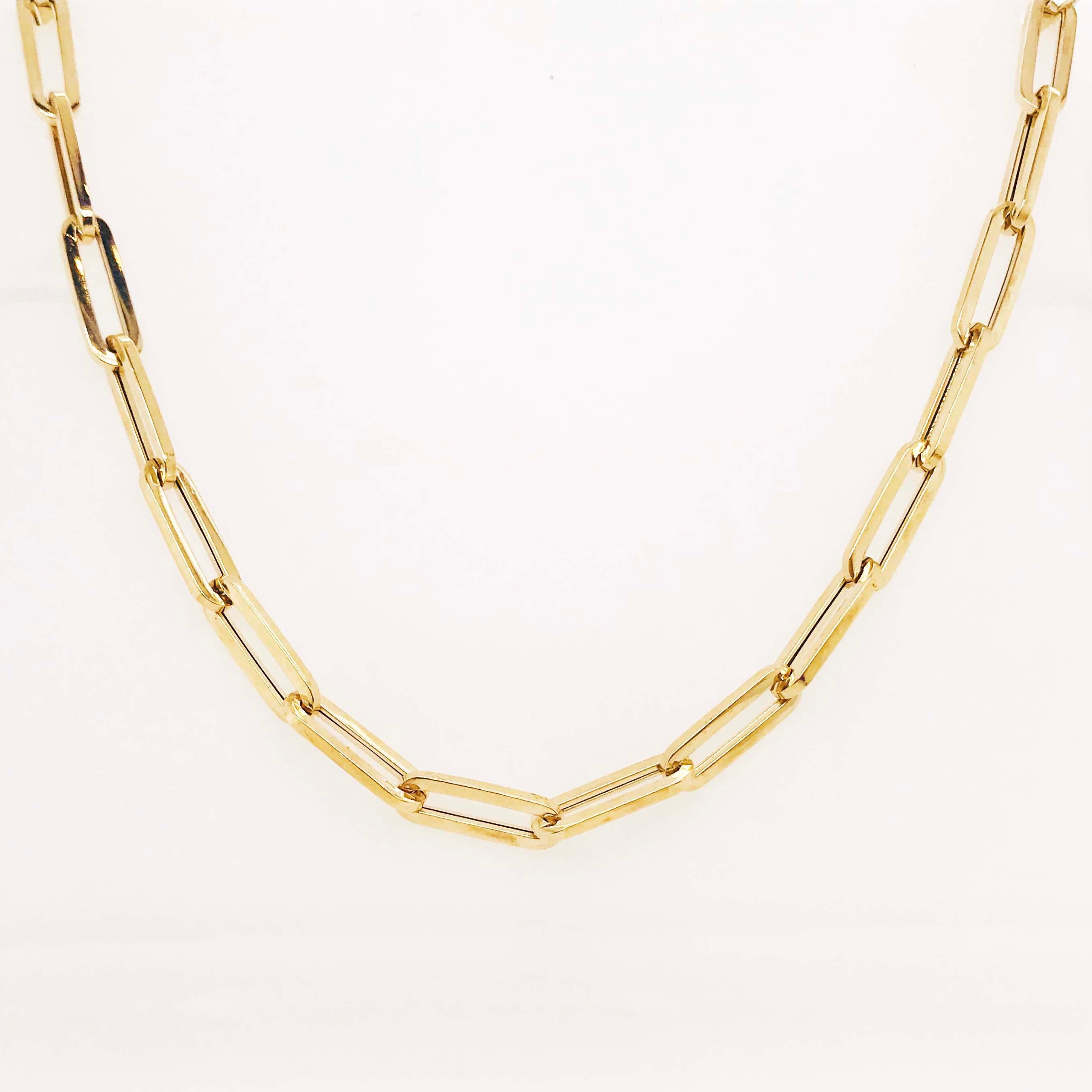 This 14 karat gold gorgeous, fashionable paperclip link chain is a handmade paperclip large link chain necklace. With each link handmade in 14k yellow gold. The links are squared and 5.25mm thick. The necklace is 5.25mm wide and 18 inches long. This