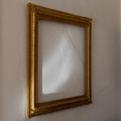 Gold patinated mirror frame, 19th century
