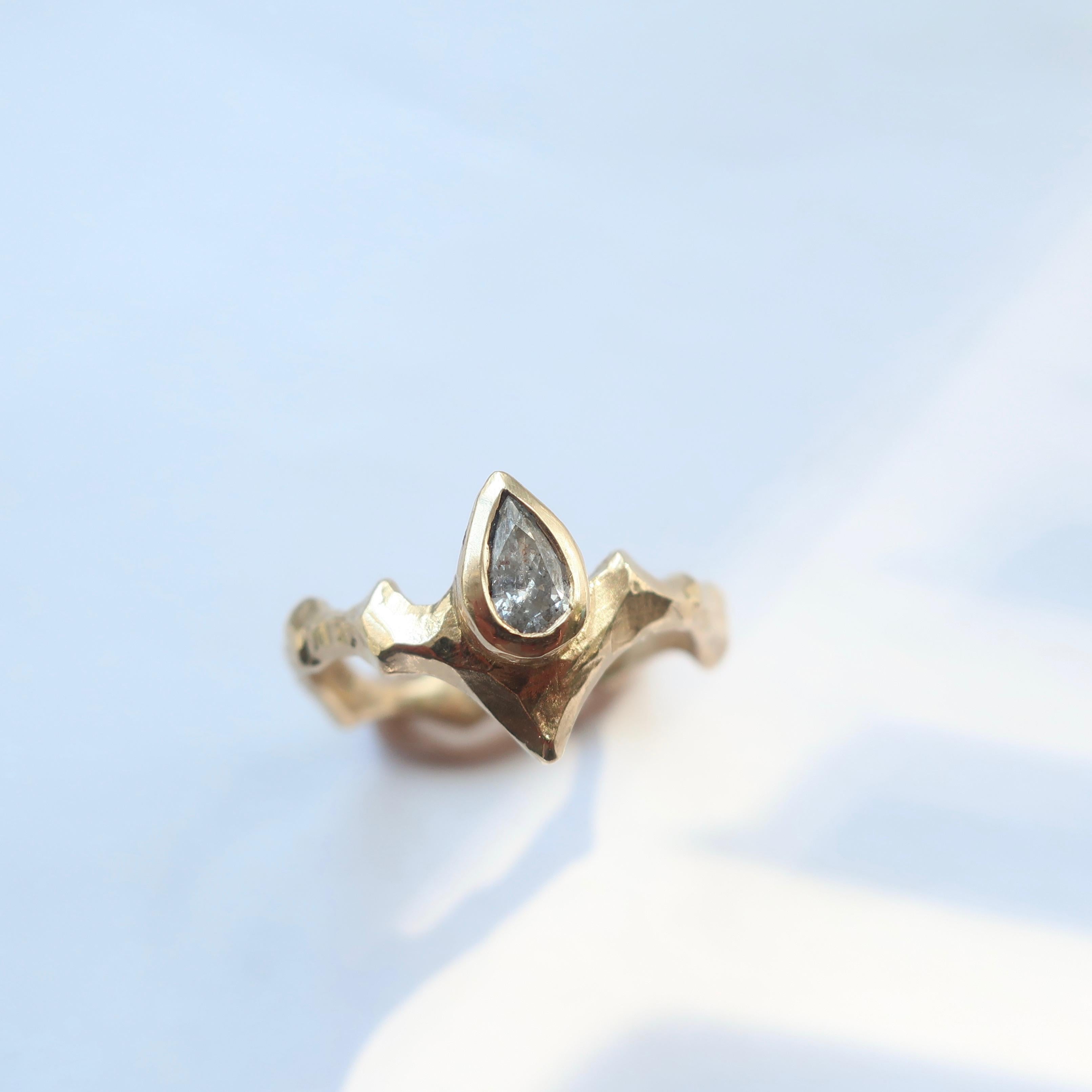 Pear Cut Gold Pear Solitaire Ring with Angled Band