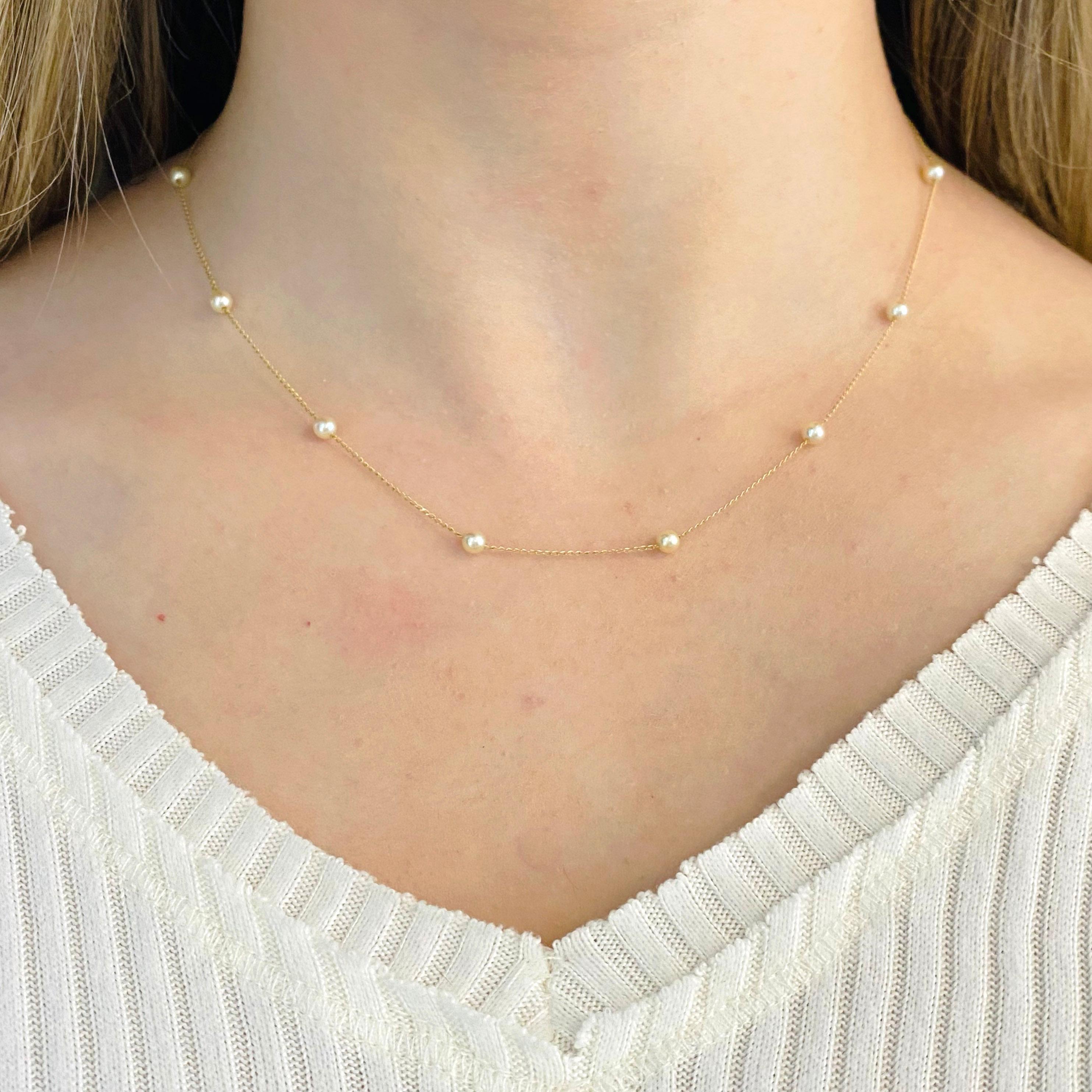 This pearl choker necklace has 13 pearl stations on a 16 inch cable chain in yellow gold.  The genuine cultured saltwater pearls are beautiful and white in color.  The pearls are 3.5 to 4 millimeters in size.
The details for this beautiful necklace