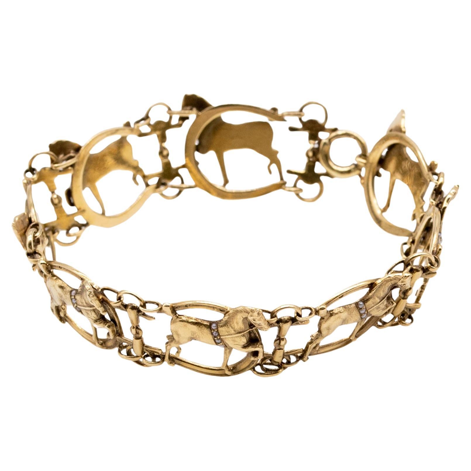 Eight sprightly horses prancing around your wrist, tethered together with stirrups - what more could a horse lover want in an everyday jewel?  Crafted in 14 karat yellow gold, the horse motifs are adorned with bridles made of tiny white pearls. 