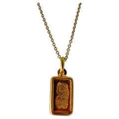 Pendentif ingot en or .999 La chaîne en or jaune 14 carats du pendentif mesure 18 pouces