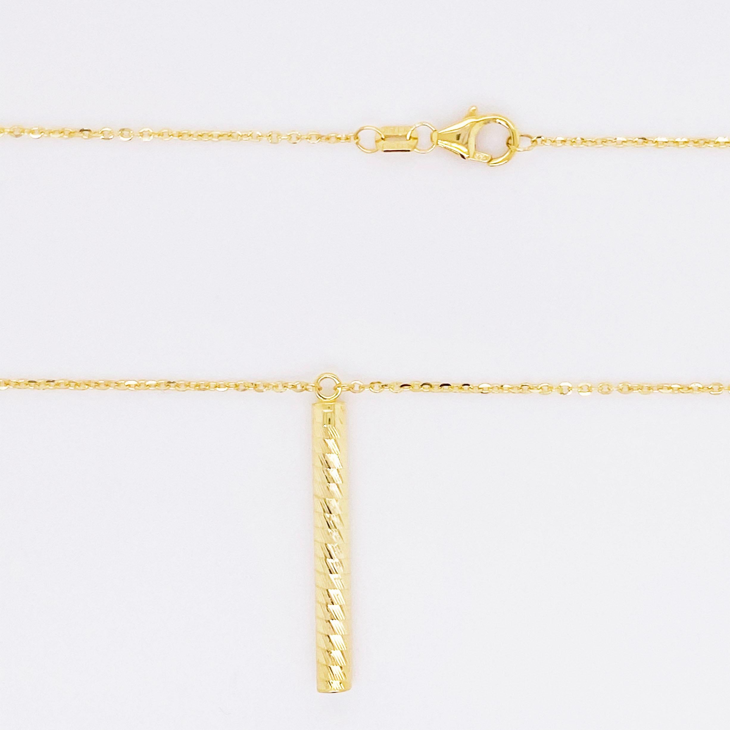 gold cylinder necklace
