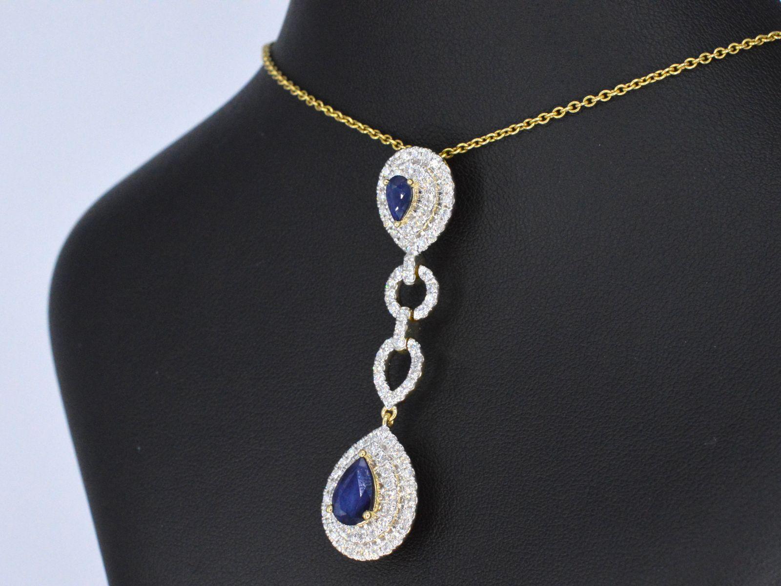Contemporary Gold Pendant Set with Diamonds and Sapphires For Sale
