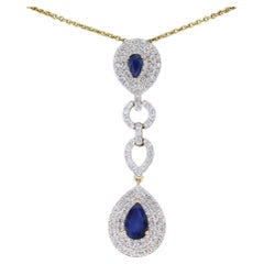 Gold Pendant Set with Diamonds and Sapphires