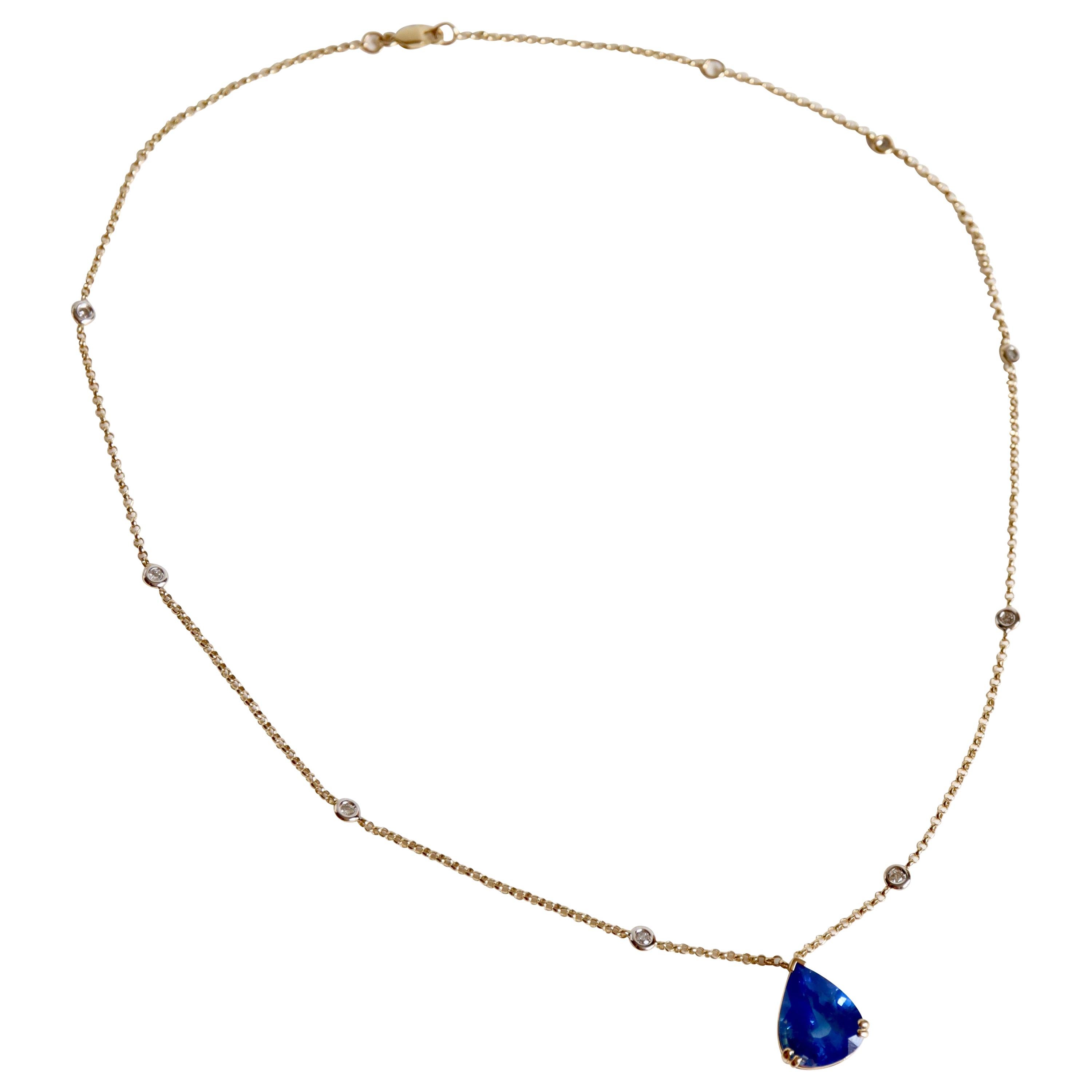 Gold Pendant with Sapphire 6.38 Carat Pear-Cut  For Sale