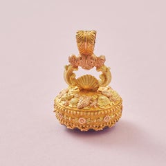 gold pendant with amethyst