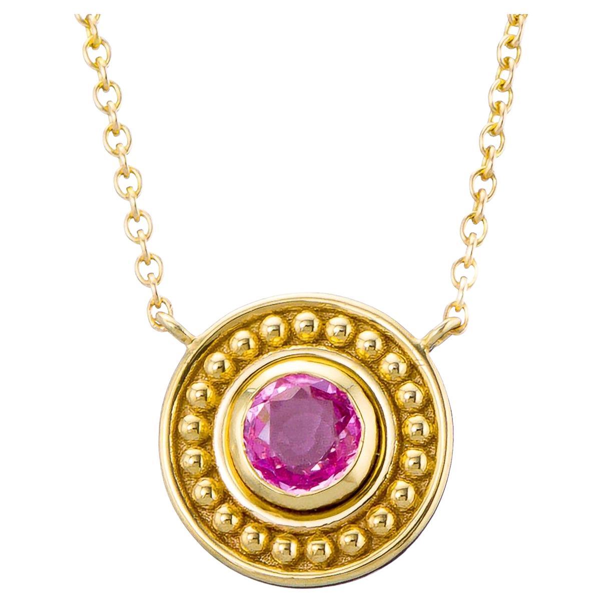 Gold-Anhänger mit rundem rosa Saphir im Angebot