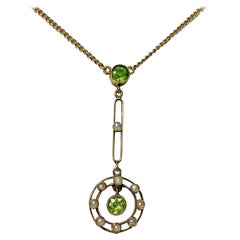 Gold Peridot Pearl Pendant American, circa 1910