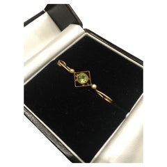 Gold, Peridot & Seed Pearl Australian Dress Pin. Edwardian, beginning of XX c.