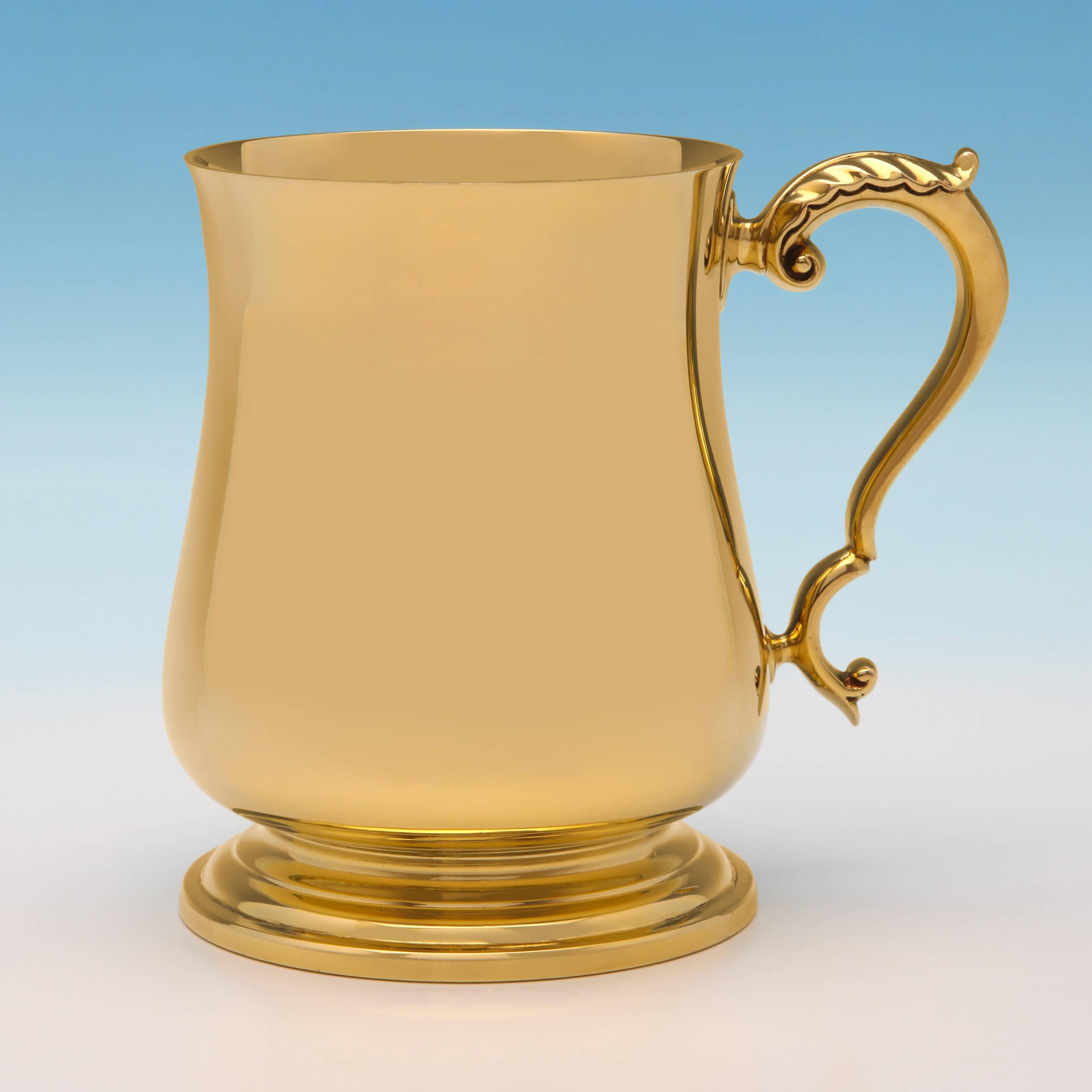 Made in Birmingham in 1968 by Prestons Ltd., this incredibly rare 18-carat gold pint mug is a true statement piece for any serious beer lover. It has been beautifully crafted in the style of a George III pint mug with an acanthus scroll handle and